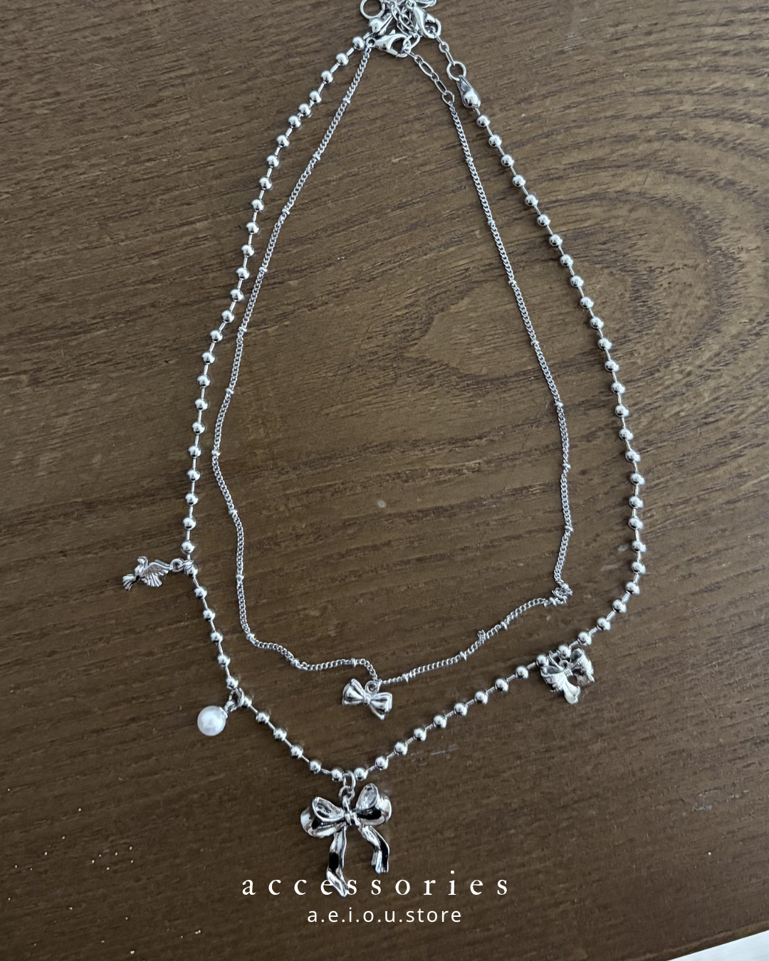 AC313- Ribbon Bird Necklace Set