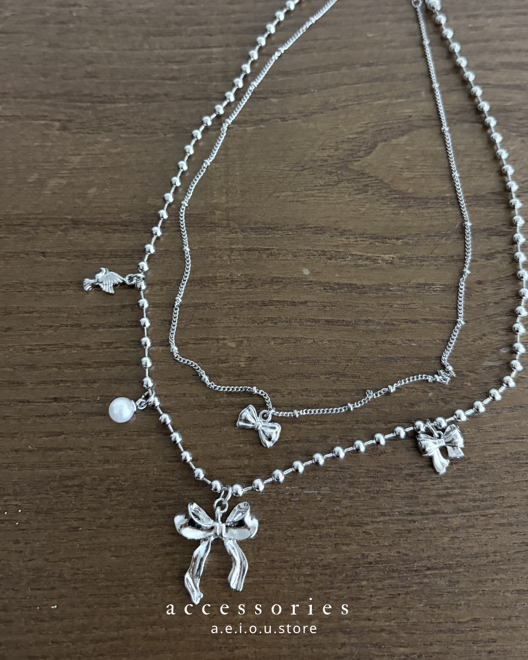 AC313- Ribbon Bird Necklace Set